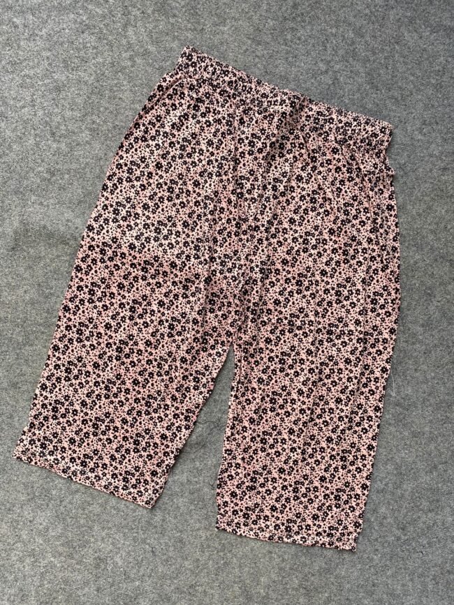 Baby pink with black flower